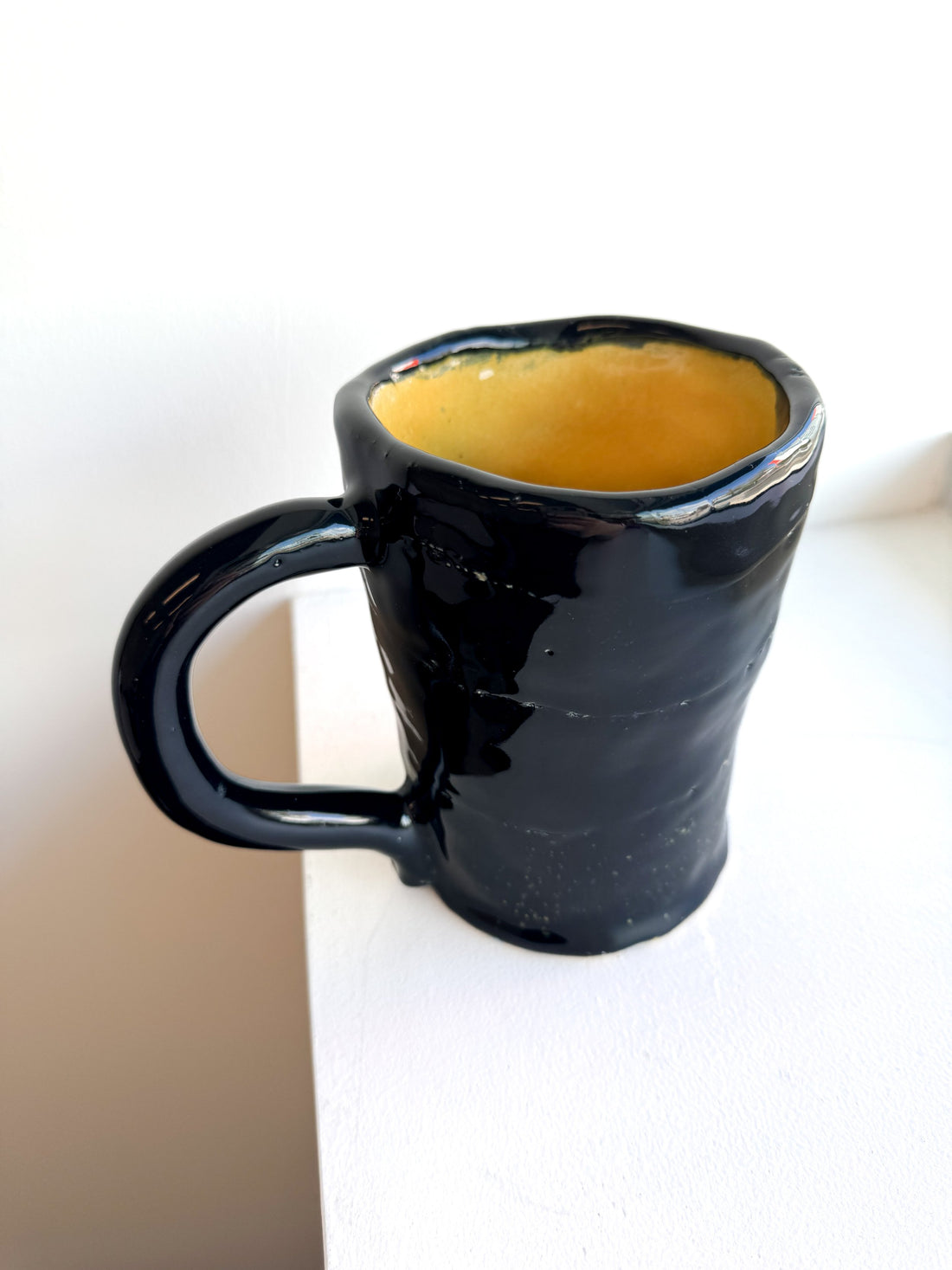 Black and Yellow Cup by Armando Farillas