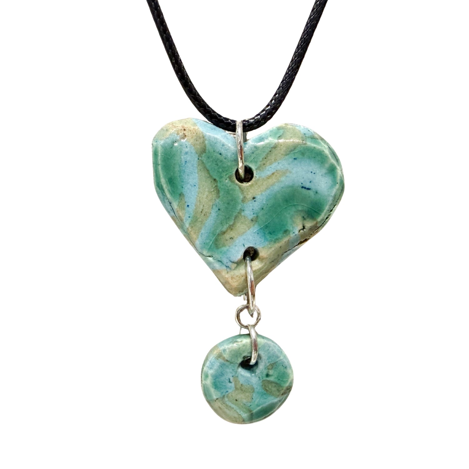 Untitled (green and blue heart necklace) by Trisha Cozine