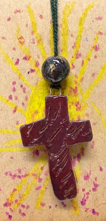 Untitled (ceramic brown cross) by Trisha Cozine
