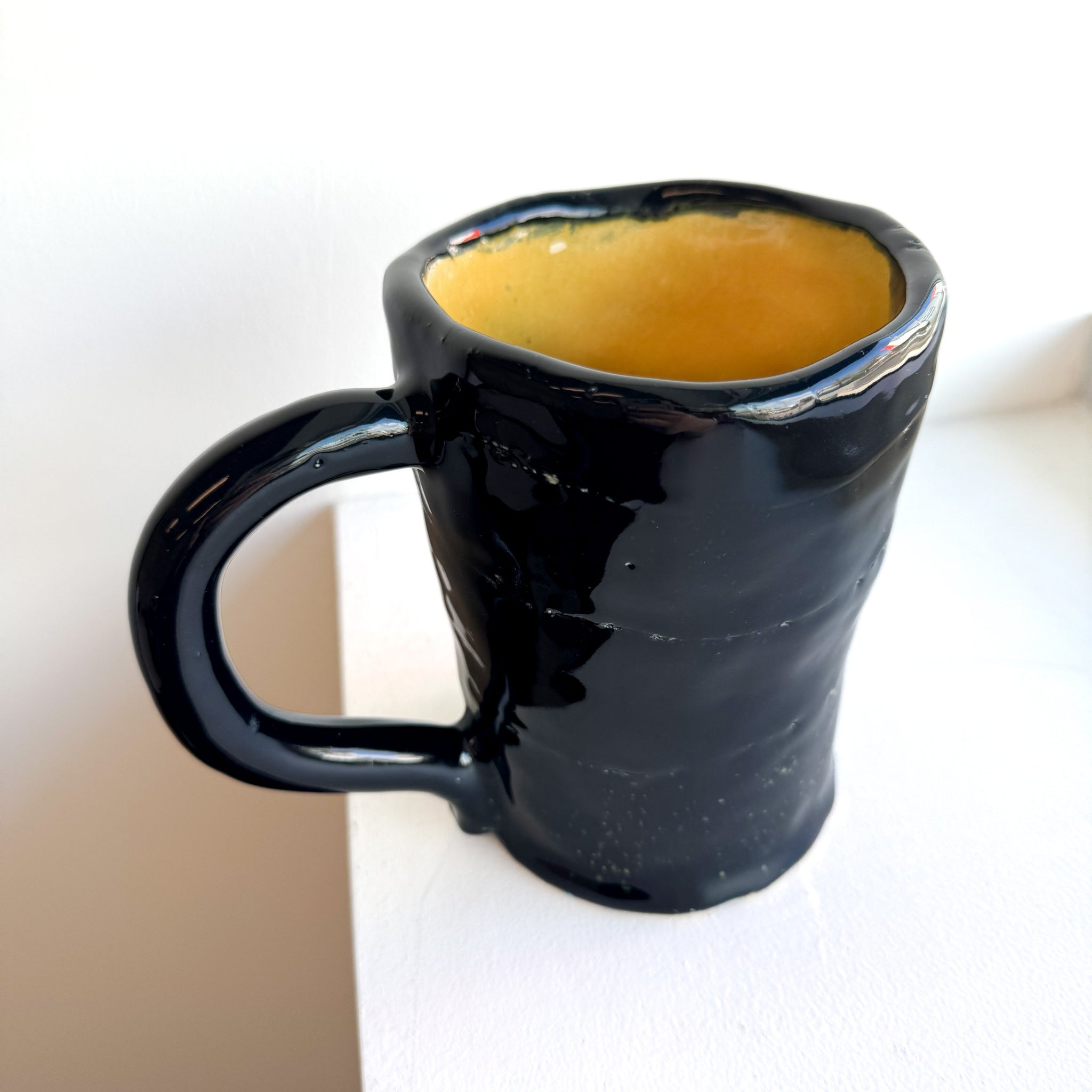 Black and Yellow Cup by Armando Farillas